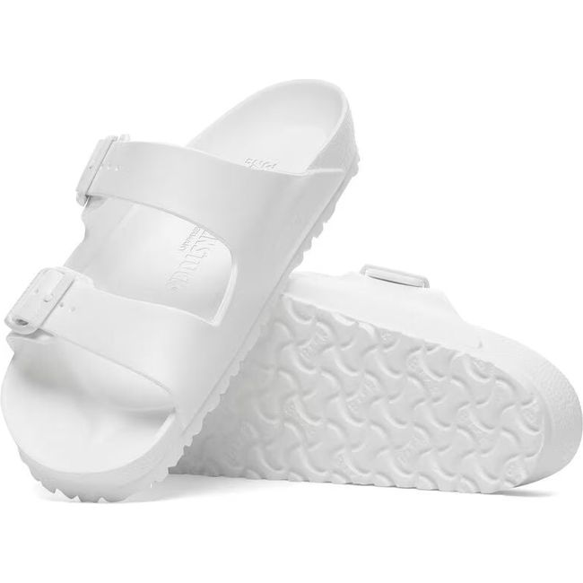 Birkenstock Arizona EVA White Two Strap Sandals. One shows the sole and the other the upper