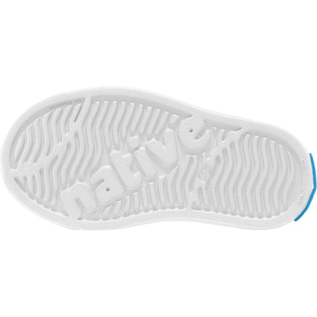 Sole view of the Native Kids' Jefferson Shoe in shell white, featuring the word 'native' embossed in the tread.