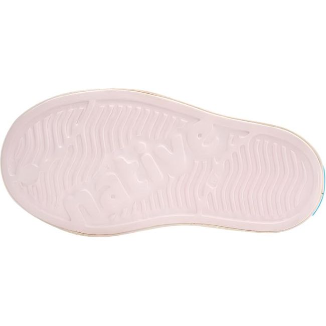 Sole view of the Native Kids' Jefferson Shoe in pink, featuring the word 'native' embossed in the tread.