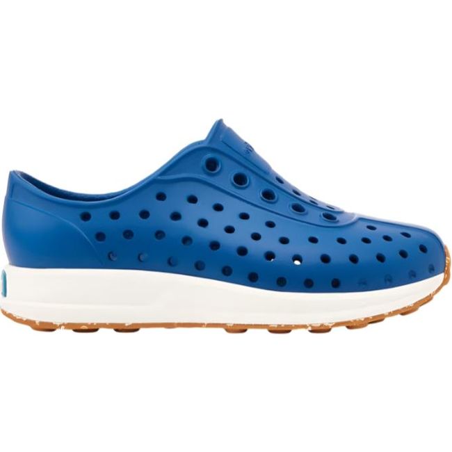 Lateral side view of the Native Little Kids' Robbie Shoe in victoria blue, featuring a perforated Sugarlite™ upper similar to Crocs, ultra-grippy rubber outsole with recycled content, and a slip-on style.