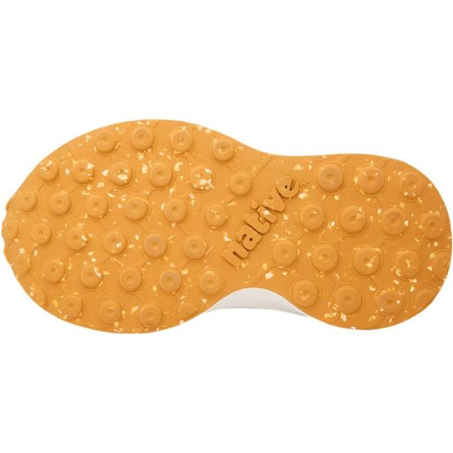 Sole view of the Native Little Kids' Robbie Shoe in victoria blue, showcasing the ultra-grippy tan rubber outsole with flecks of white.