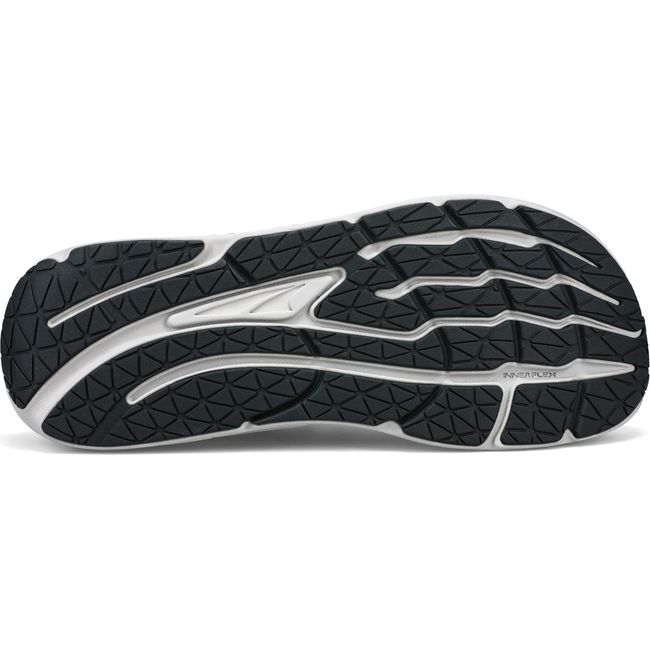Sole of Altra Women&#39;s Paradigm 7 Running Shoe with a white sole and black tread