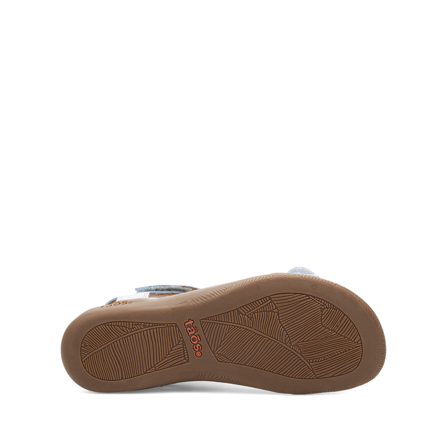 Outsole of the Taos The Show sandal in chambray blue showing the tread
