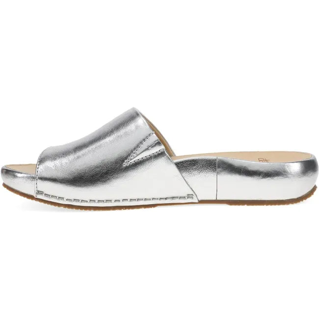 Dansko Twyla slide sandal in pewter metallic leather, side profile showing platform
