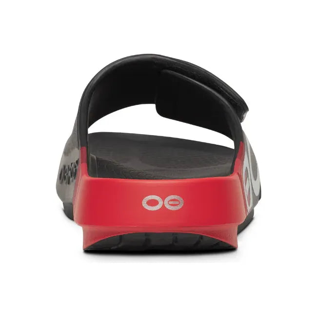 Heel of Unisex OOfos OOahh Sport Flex Slide Sandal in Black and Fire Rally Red