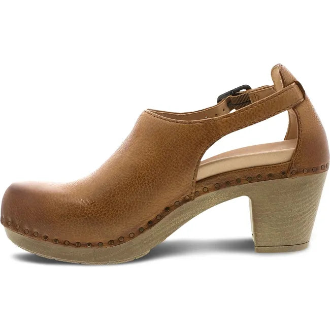 Medial side of Women's Dansko Sassy Closed Toe Heel in tan leather with 2 inch heel