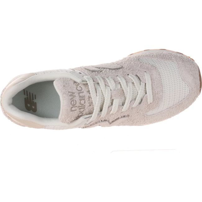 Lace up upper of Women's New Balance 574 Lifestyle Shoe in Sea Salt beige