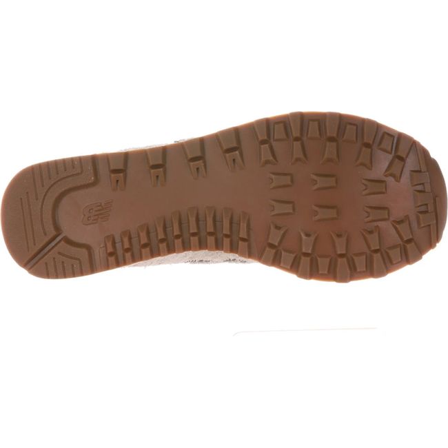 Tan sole of Women's New Balance 574 Lifestyle Shoe in Sea Salt beige