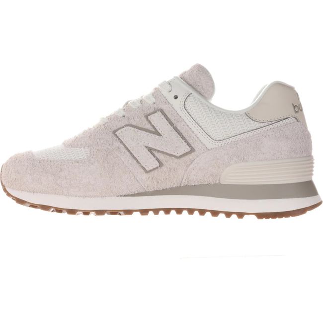 Medial side of Women's New Balance 574 Lifestyle Shoe in Sea Salt beige
