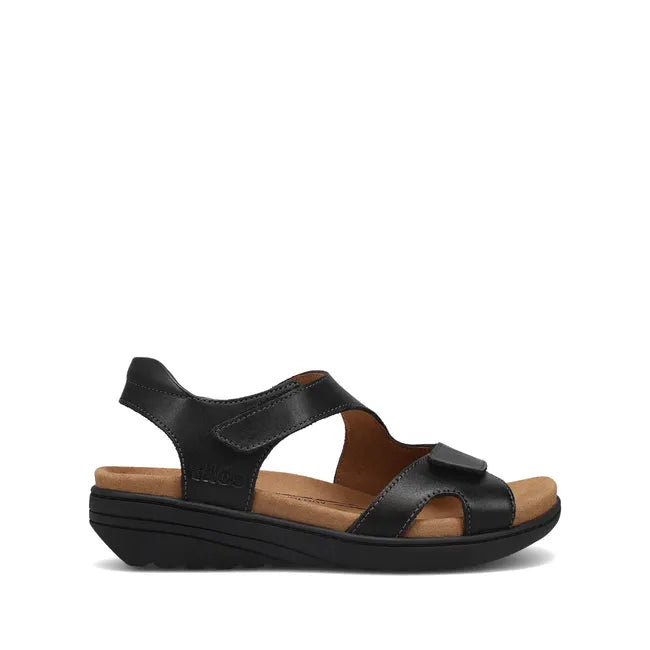 Lateral side of Women's Taos Serene Sandal in Black leather with velcro straps