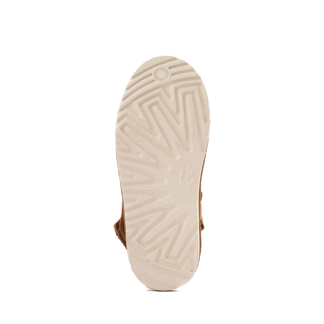 White sole of UGG Youth Goldenstar Clog in Chestnut Brown Suede