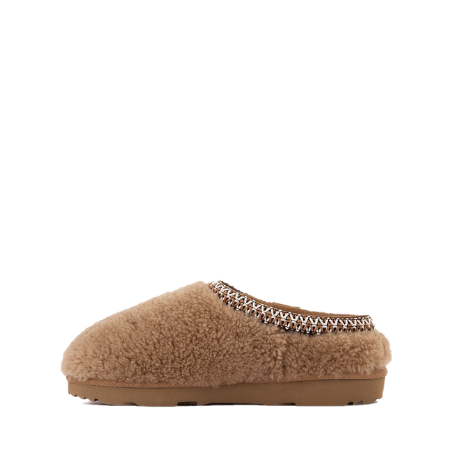 Medial side of UGG Kid&#39;s Maxi Curly Tasman Slipper in Chestnut Brown