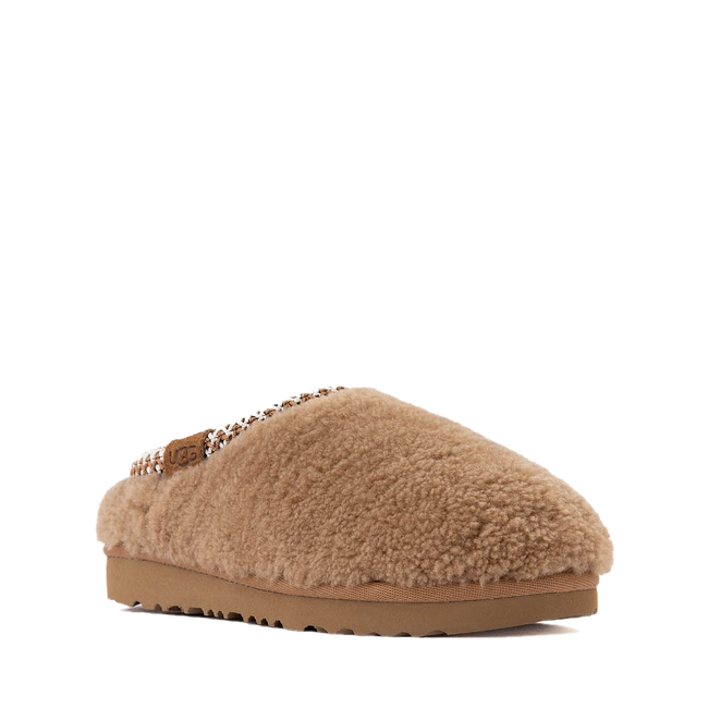 Angled side of UGG Kid&#39;s Maxi Curly Tasman Slipper in Chestnut Brown