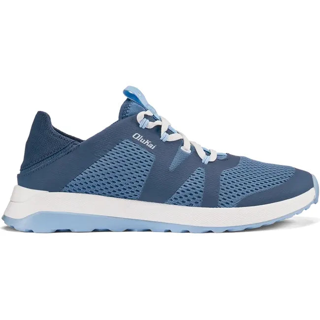 Lateral side of women's Olukai Huia Sneaker in Blue, with a mesh upper and white sole