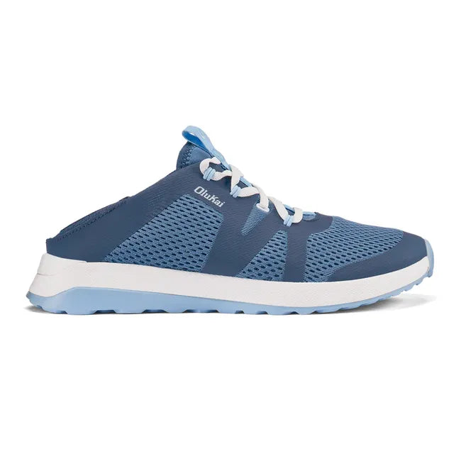 Lateral side of women's Olukai Huia Sneaker in Blue. Mesh upper and white sole. Drop in heel down