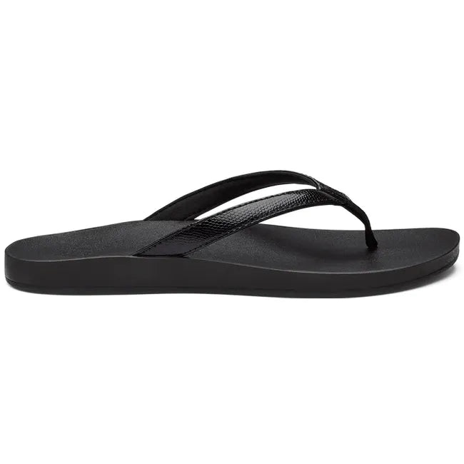 Lateral view of Women's Olukai Puawe Flip Flop in all black