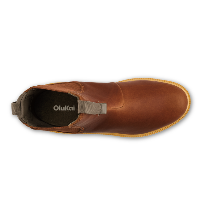 Top down view of womens Olukai Hehi Waterproof Boot. Brown leather upper and elastic side panels