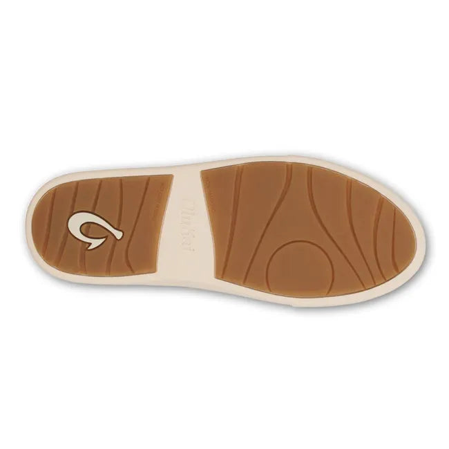 Sole of Olukai Haupu Hulu Sneaker in Tan with white sole and gum bottom tread