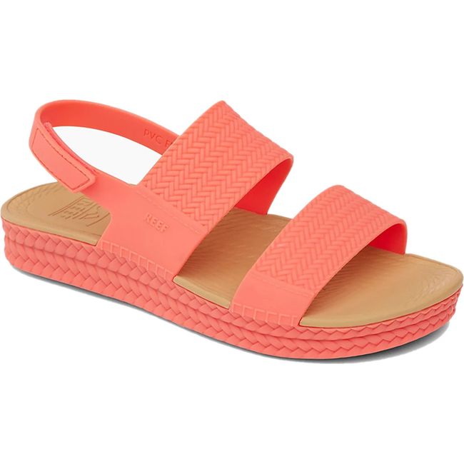 Front angled view of Women's Reef Water Vista Sandal in Sunset Coral with velcro backstrap