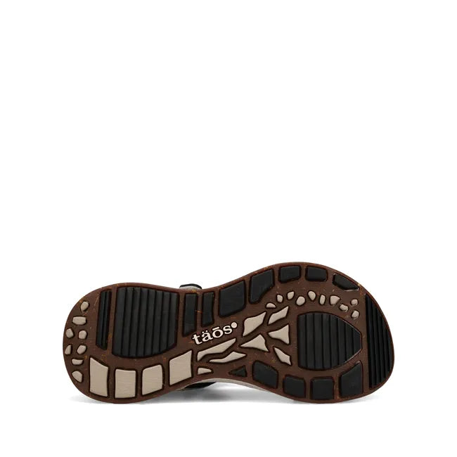 Rugged black sole of Women's Taos Super Side Sandal in Ice Emboss upper