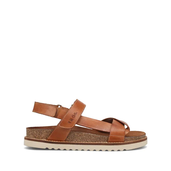 Lateral side of Women's Taos Sideways Sandal in Caramel leather with velcro straps and cork