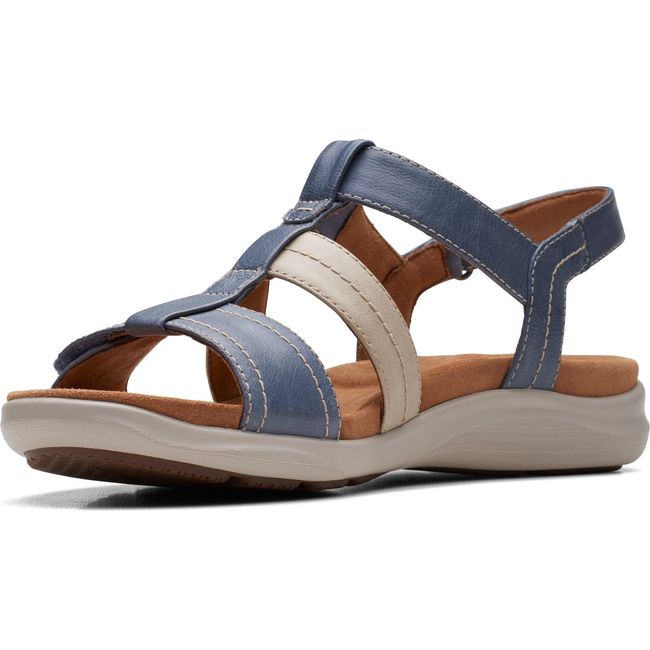 Medial side angled of Women&#39;s Clarks Kitly Step Sandal in Denim Combination leather with backstrap