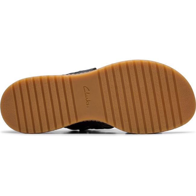 Sole of Women&#39;s Clarks Kassanda Wedge Sandal in Black Combination Leather upper with tan outsole