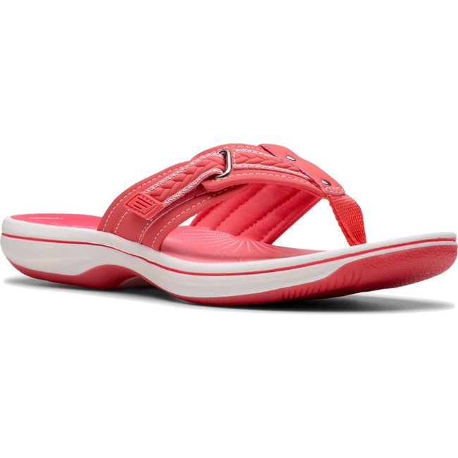 Front angled view of Women's Clarks Breezy Sun Flip Flop Sandal in Bright Coral Pink with velcro