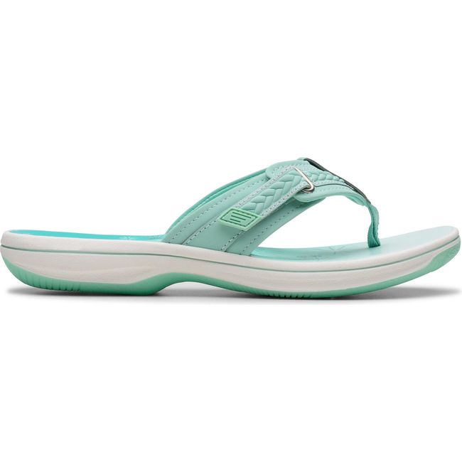Lateral side of Women&#39;s Clarks Breezy Sun Flip Flop Sandal in Mint Ombre Green with velcro strap