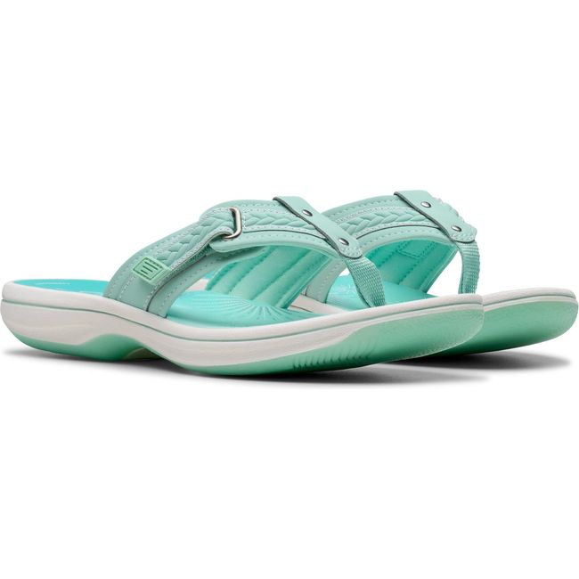 Pair of Women&#39;s Clarks Breezy Sun Flip Flop Sandals in Mint Ombre Green with velcro straps