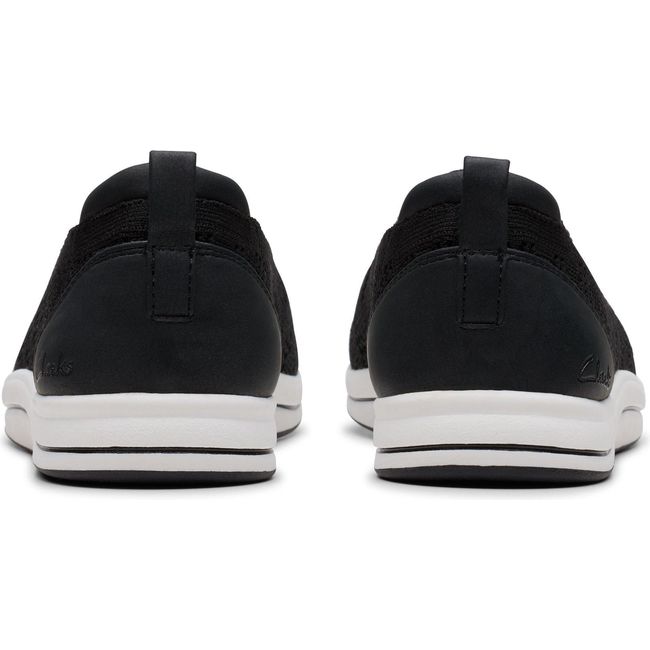 Heels of Women&#39;s Clarks Breezey Izzy Slip On Sneakers in Black knit mesh with white sole