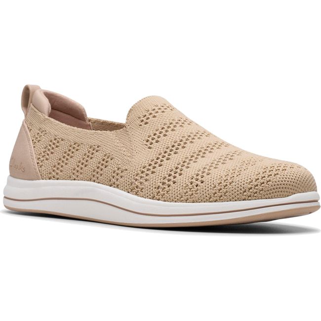 Front angled view of Women's Clarks Breezey Izzy Slip On Sneaker in Sand knit mesh