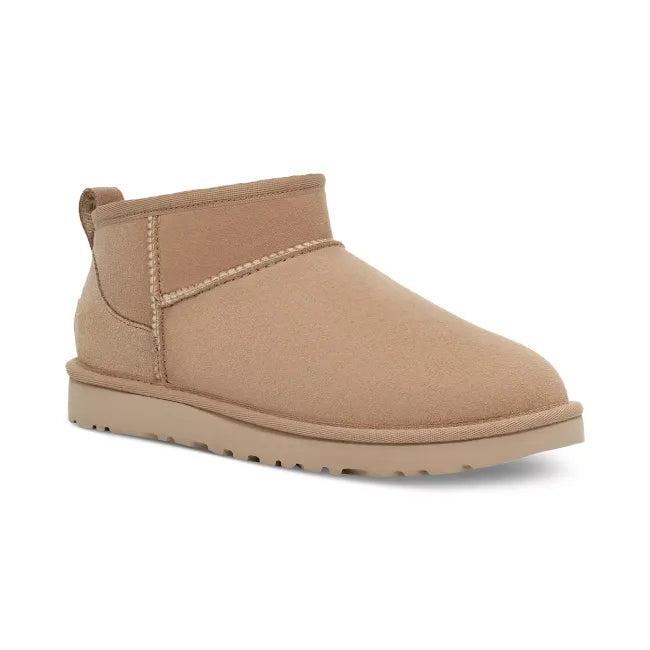 Front angled view of UGG Women's Classic Ultra Mini Boot in sand beige