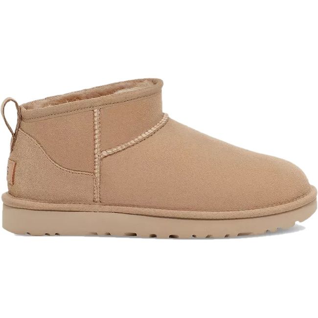 Side of UGG Women's Classic Ultra Mini Boot in sand beige