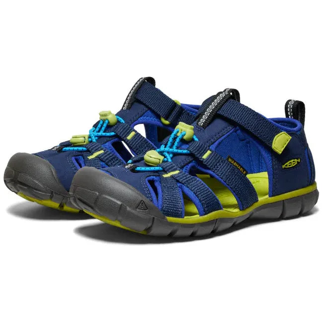 Pair of KEEN Youth Kids Seacamp II CNX Sandal in Naval Academy blue and Chartreuse green
