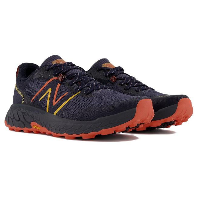 Pair of New Balance Men's Fresh Foam X Hierro V7 Trail Running Shoe in Thunder Vibrant Orange