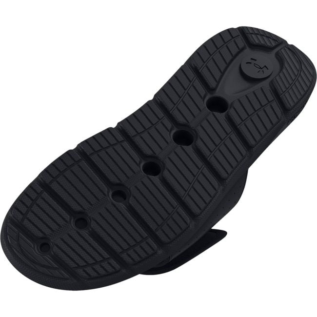 Sole of Kids Under Armour Ignite Pro Slide in black with a black outsole