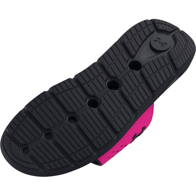 Sole of Kids Under Armour Ignite Pro Slide in black and rebel pink with black outsole