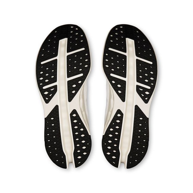 Sole of Men's On Running Cloudsurfer Max Cushioned Running Shoes in All White with black tread