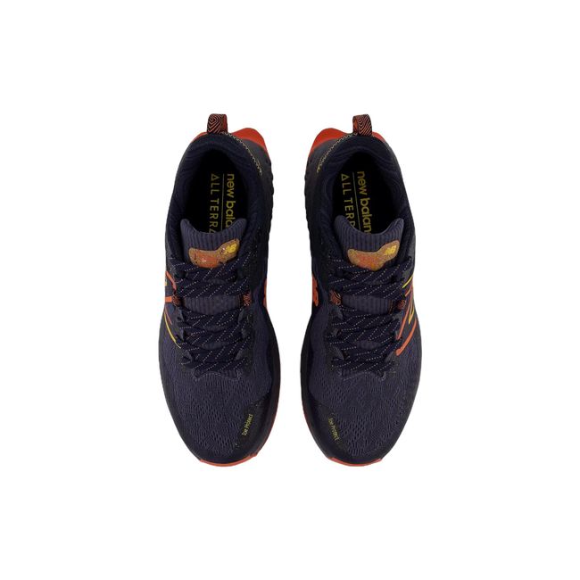 Upper of New Balance Men's Fresh Foam X Hierro V7 Trail Running Shoes in Thunder Vibrant Orange