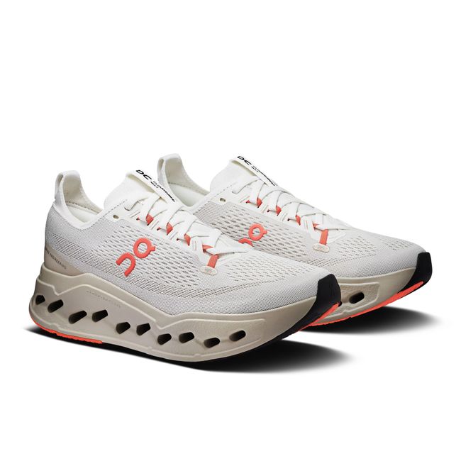 Pair of Women's On Running Cloudsurfer Max Cushioned Running Shoes in white, Ivory, Salmon