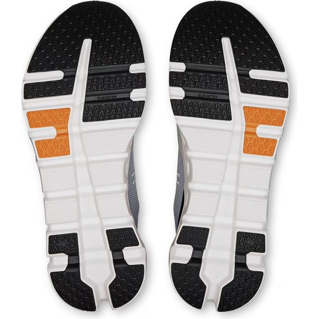 Soles of Mens On Running Cloudrunner 2 Running Shoes in Wolf and Ivory with black and orange tread