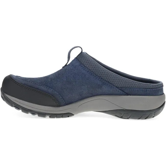 Dansko Pia clog in navy leather, side profile showing Vibram outsole