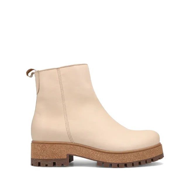 Lateral side of Women's Taos Downtown Boot in ivory leather and cork midsole
