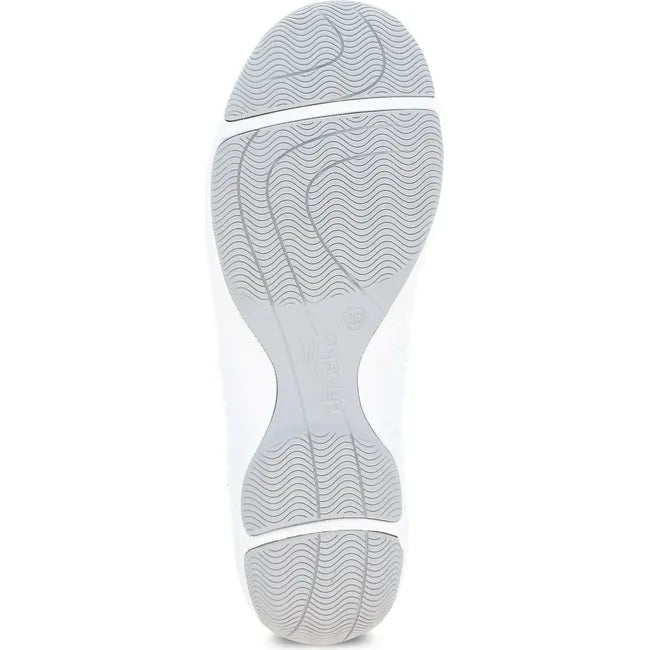 Sole of Women's Dansko Harlyn Sneaker in ecru suede upper with gray slip resistant tread