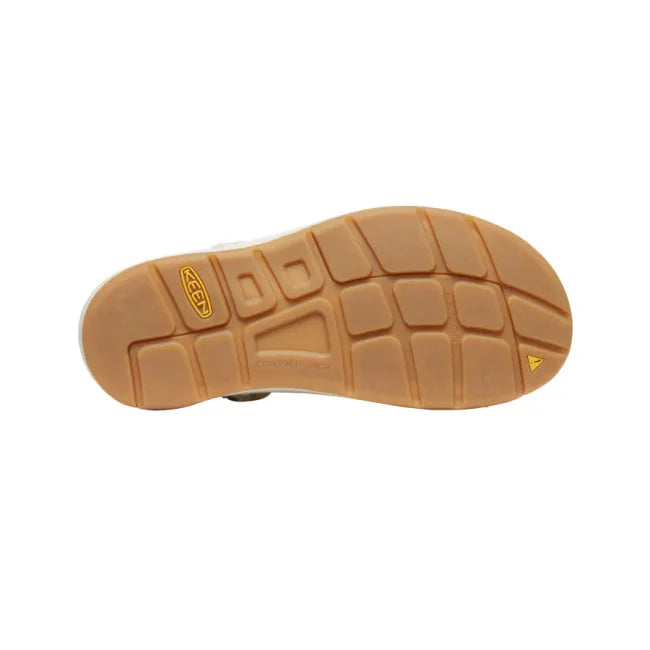 Tan sole of Keen Women's UNEEK Canvas Sandal in Natural Canvas Birch