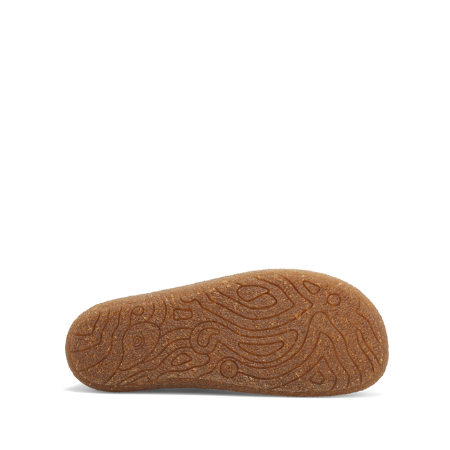 Outsole of the Taos Ultimate Mary Jane shoe in caramel leather showing the tread