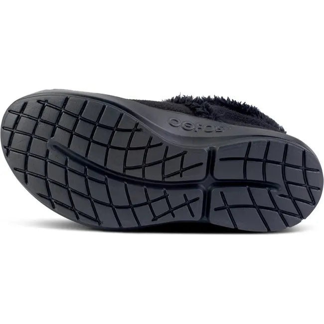Sole of Women's OOFOS OOcoozie Low Shoe in all black