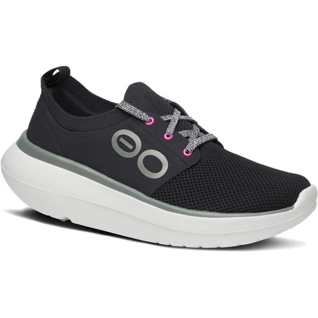 Front angled view of Women's OOfos OOmy Stride Shoe in Black and White