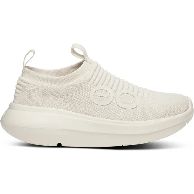 Lateral side of Women&#39;s OOfos OOmy Zen Sneaker in Chalk off white